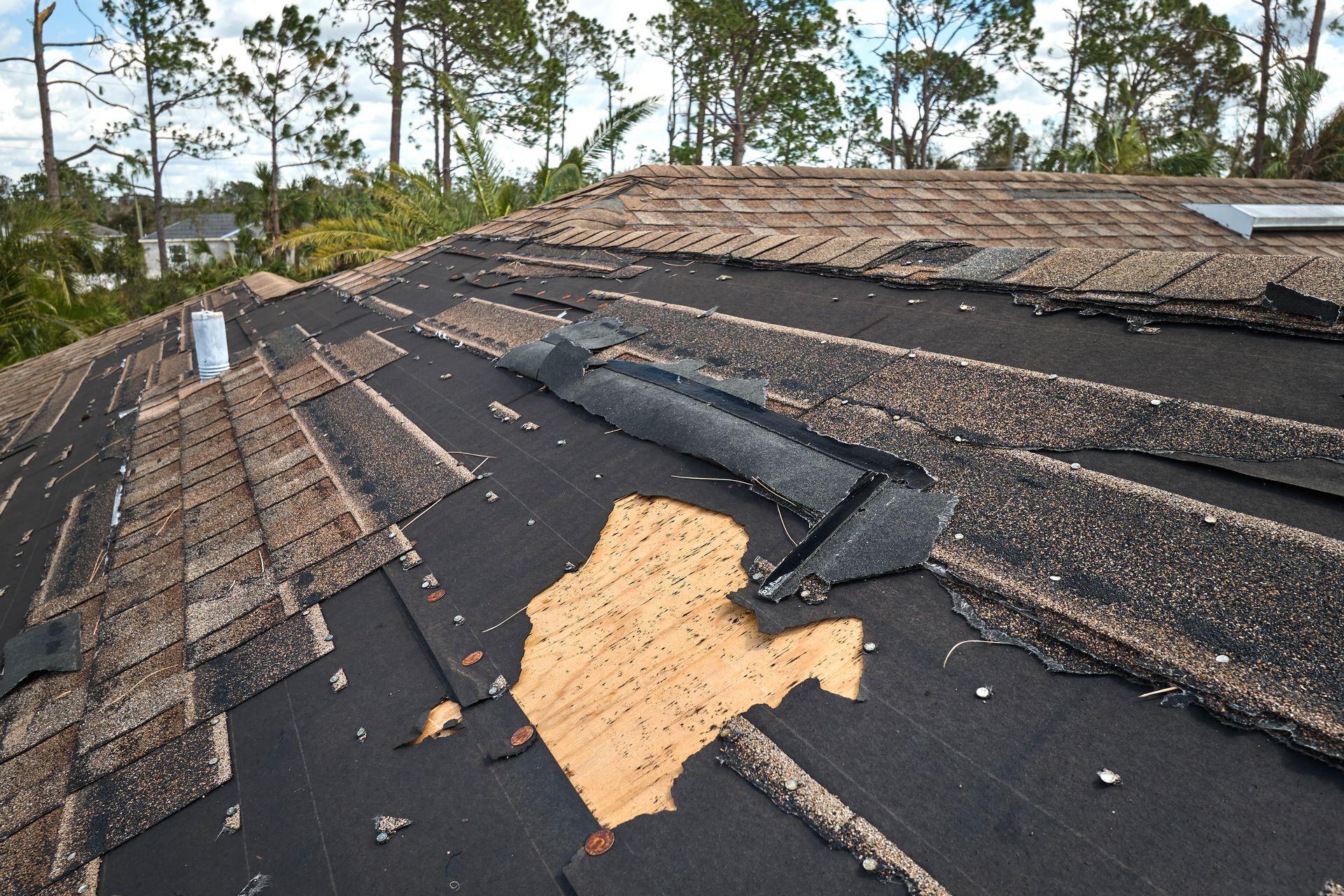 A roof that has been damaged by a storm