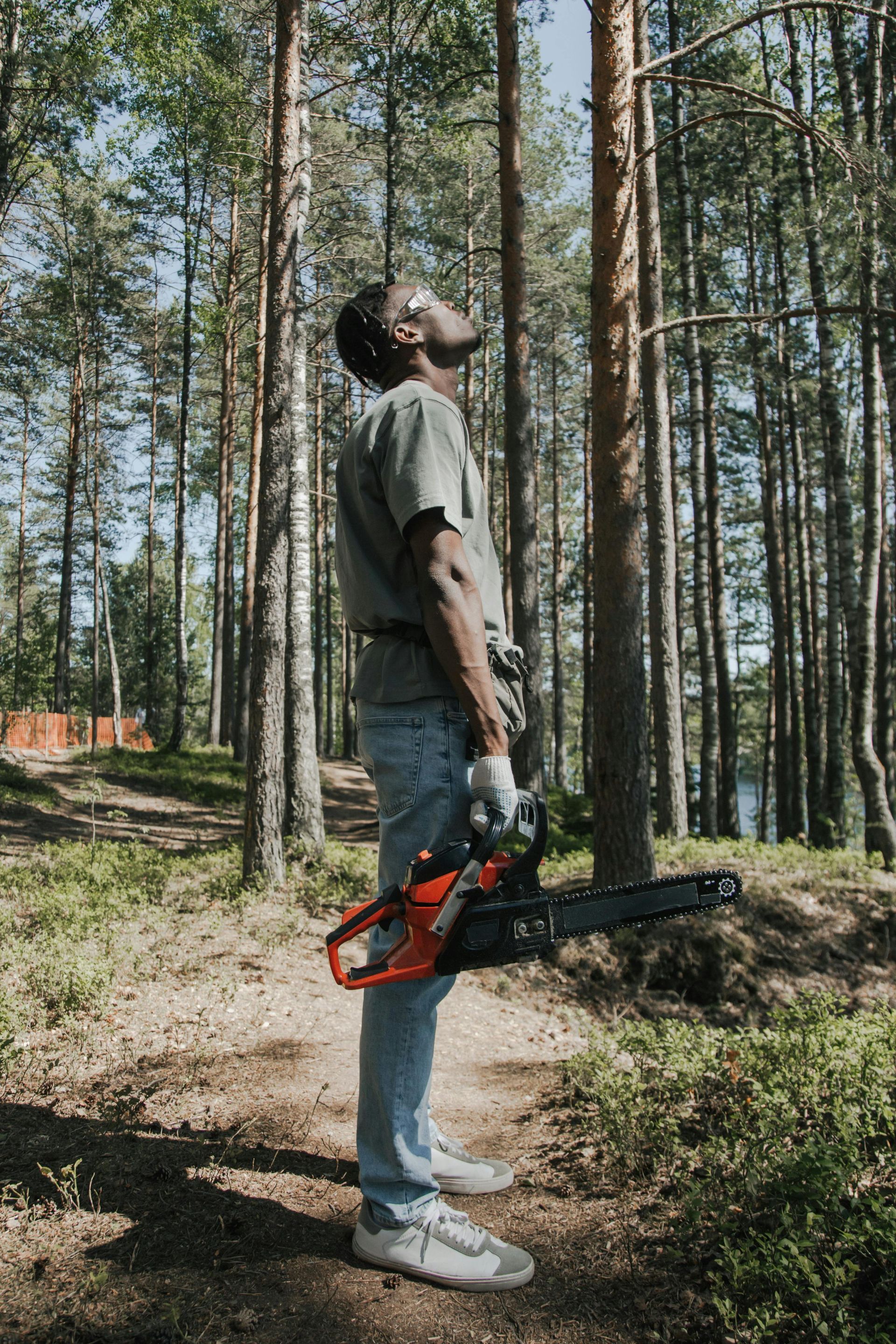 homeowner cutting timber