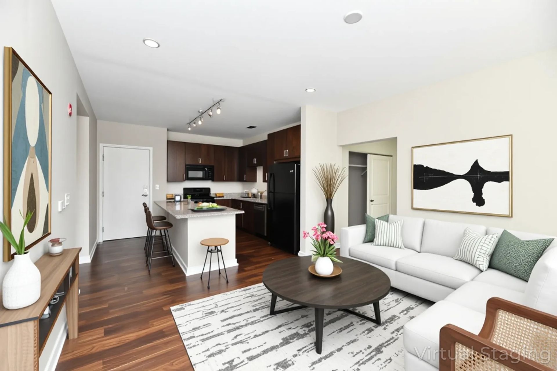 A kitchen with a granite counter top and sliding glass doors