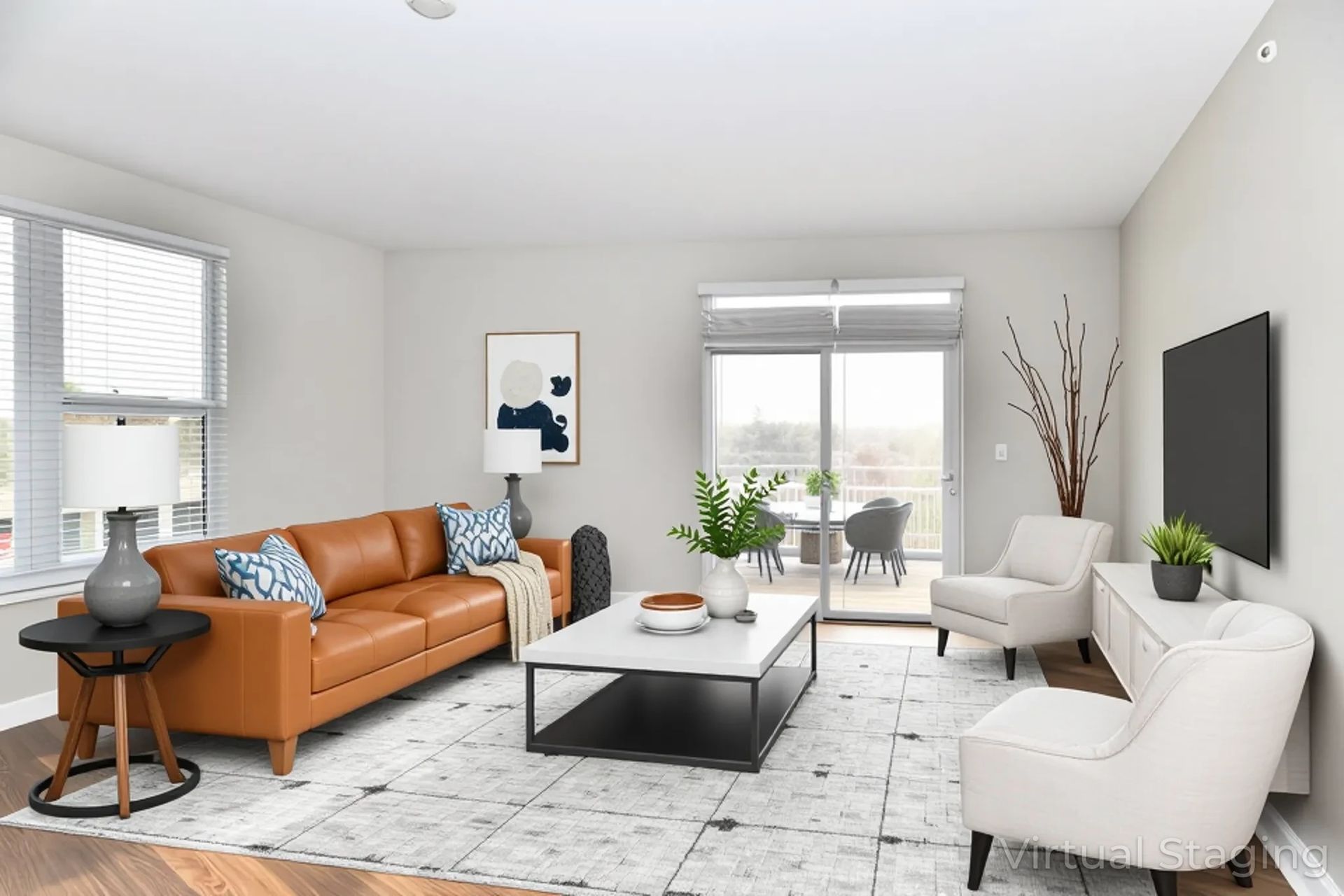 A kitchen with a granite counter top and sliding glass doors