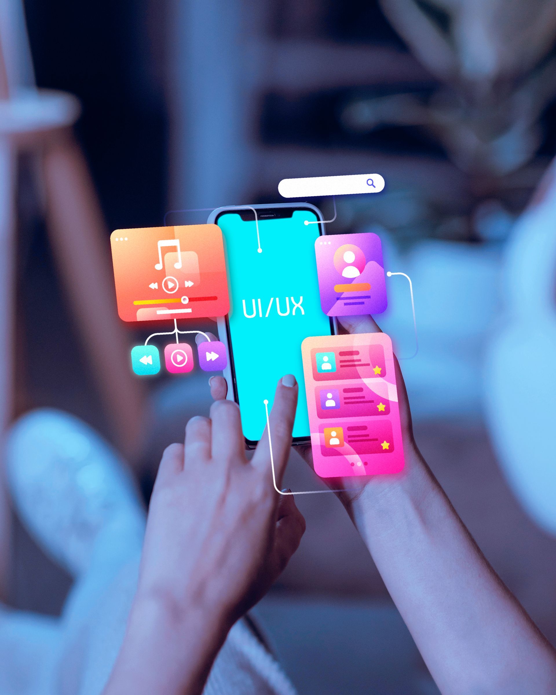 A person is holding a smart phone that says ui / ux on the screen