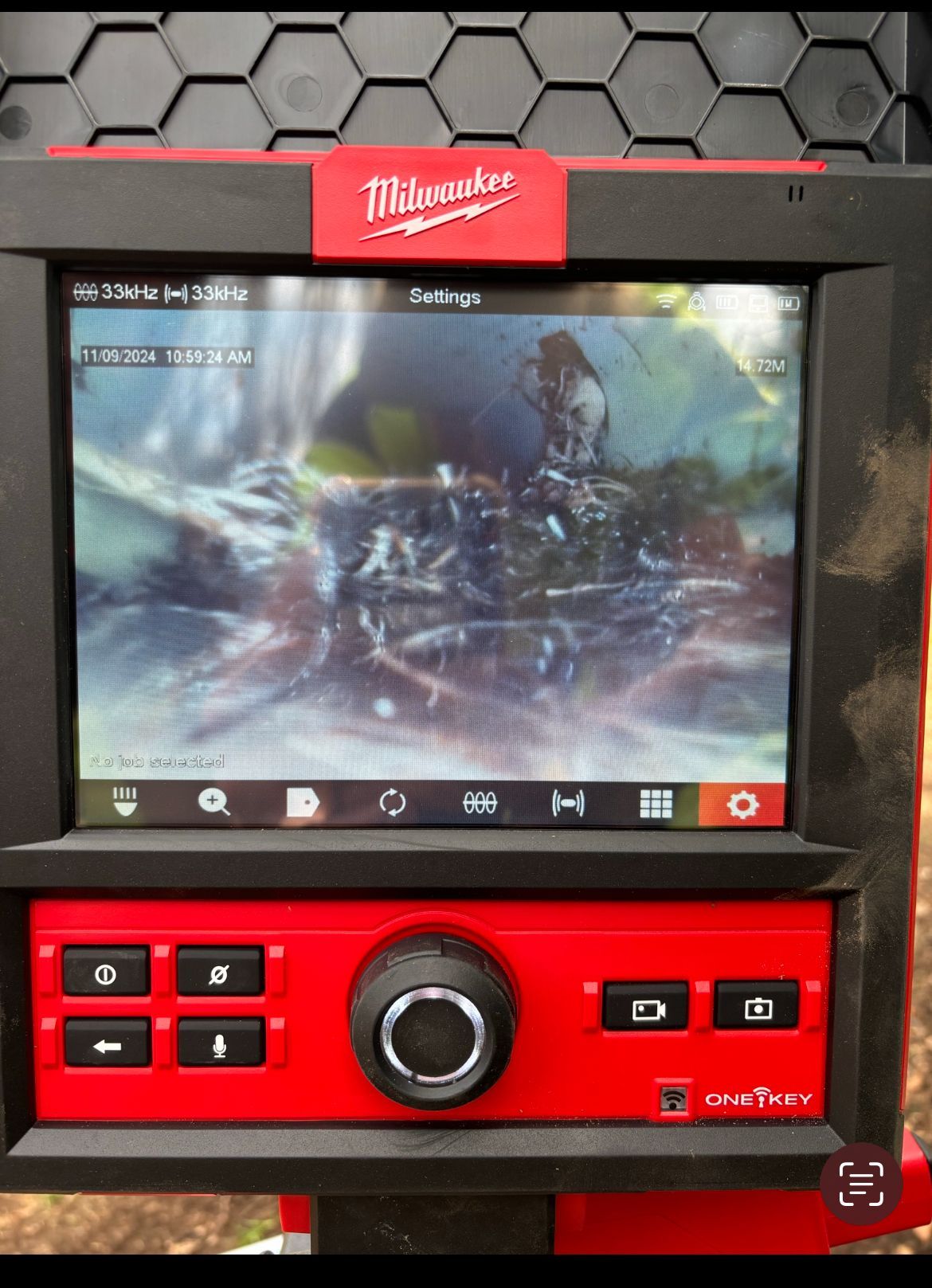 Milwaukee Pipe Inspection Camera Display Showing a Blurry View Inside a Pipe — Croker Plumbing and Gas in Goulburn, NSW