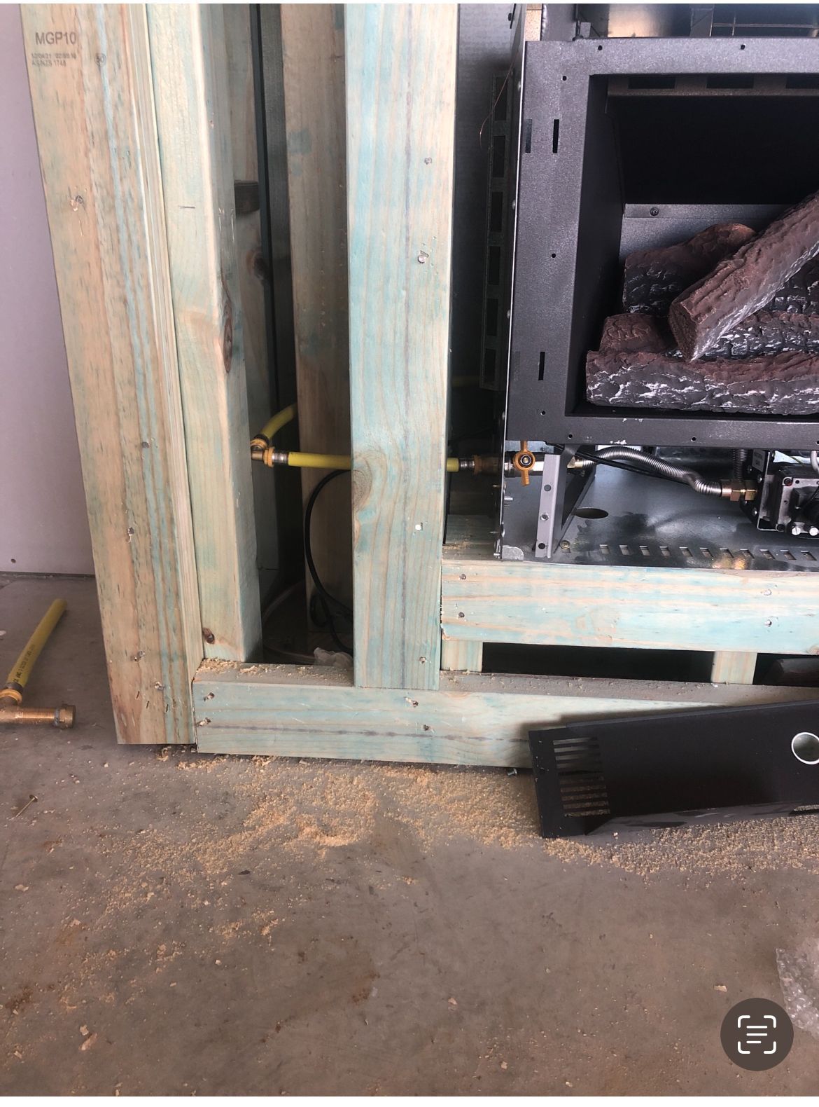 Framing Around a Fireplace, With Visible Gas Lines — Croker Plumbing and Gas in Goulburn, NSW