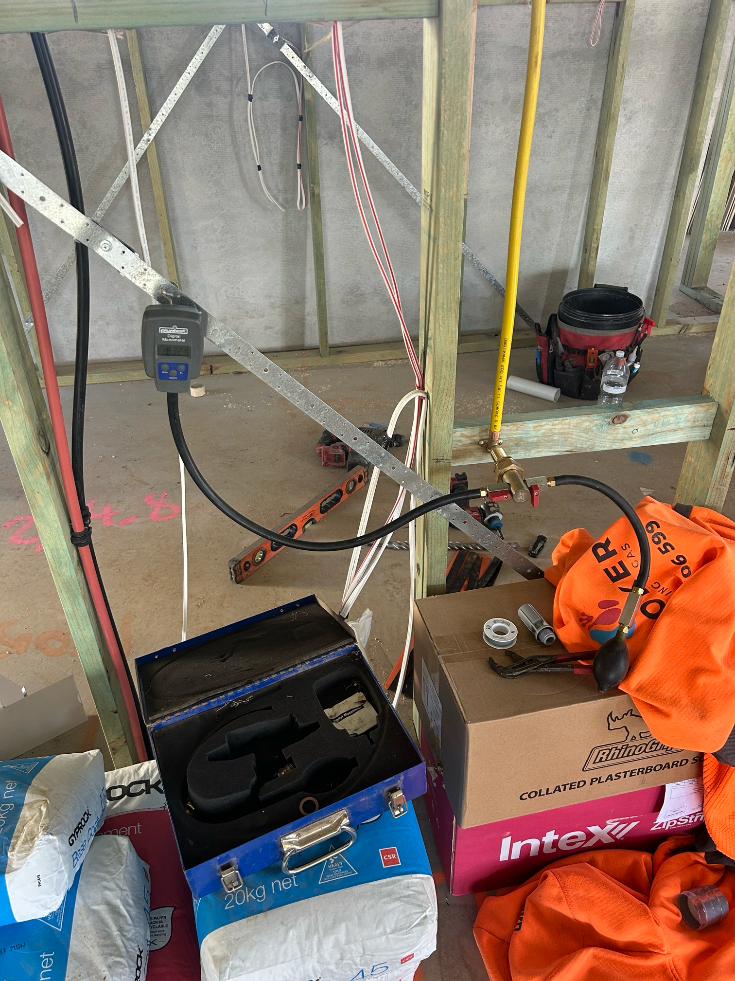 Digital Pressure Gauge Attached to Pipes and a Soldering Kit — Croker Plumbing and Gas in Goulburn, NSW