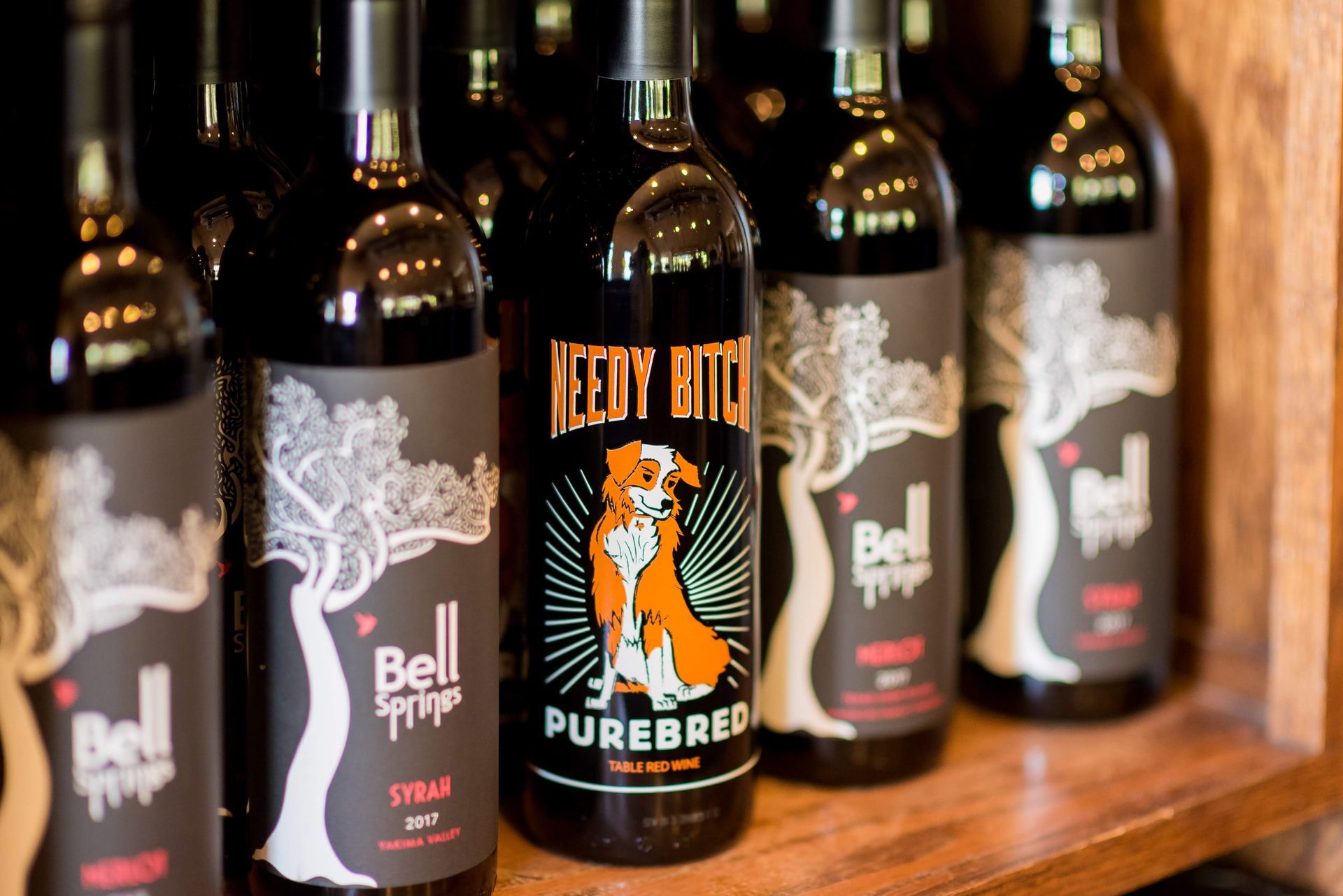 Wine bottles with labels, including