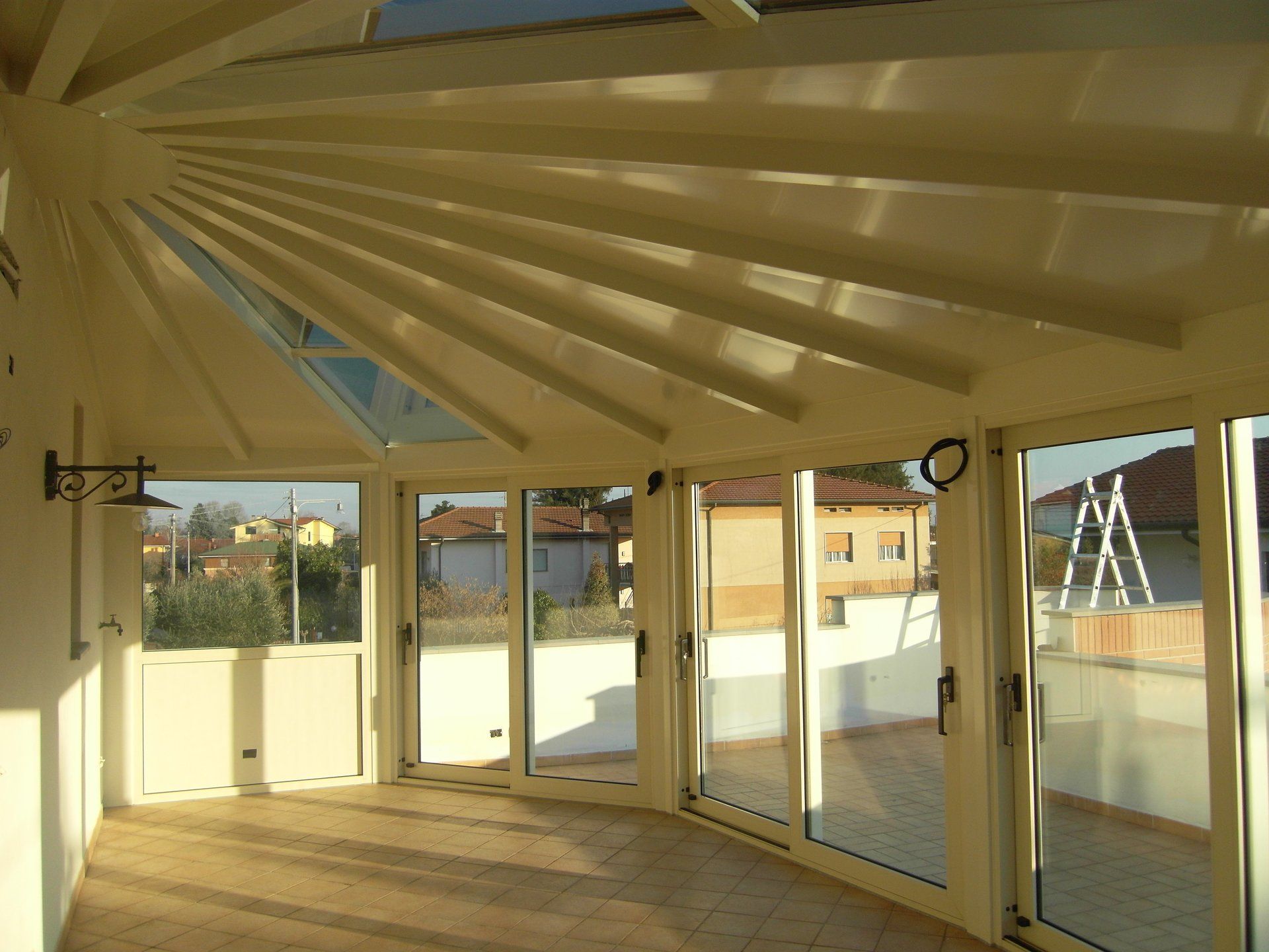 INFISSI IN ALLUMINIO ALZANTI SCORREVOLI PER GIARDINO D'INVERNO