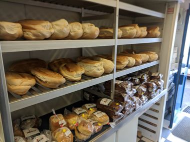 a rack filled with bakery items