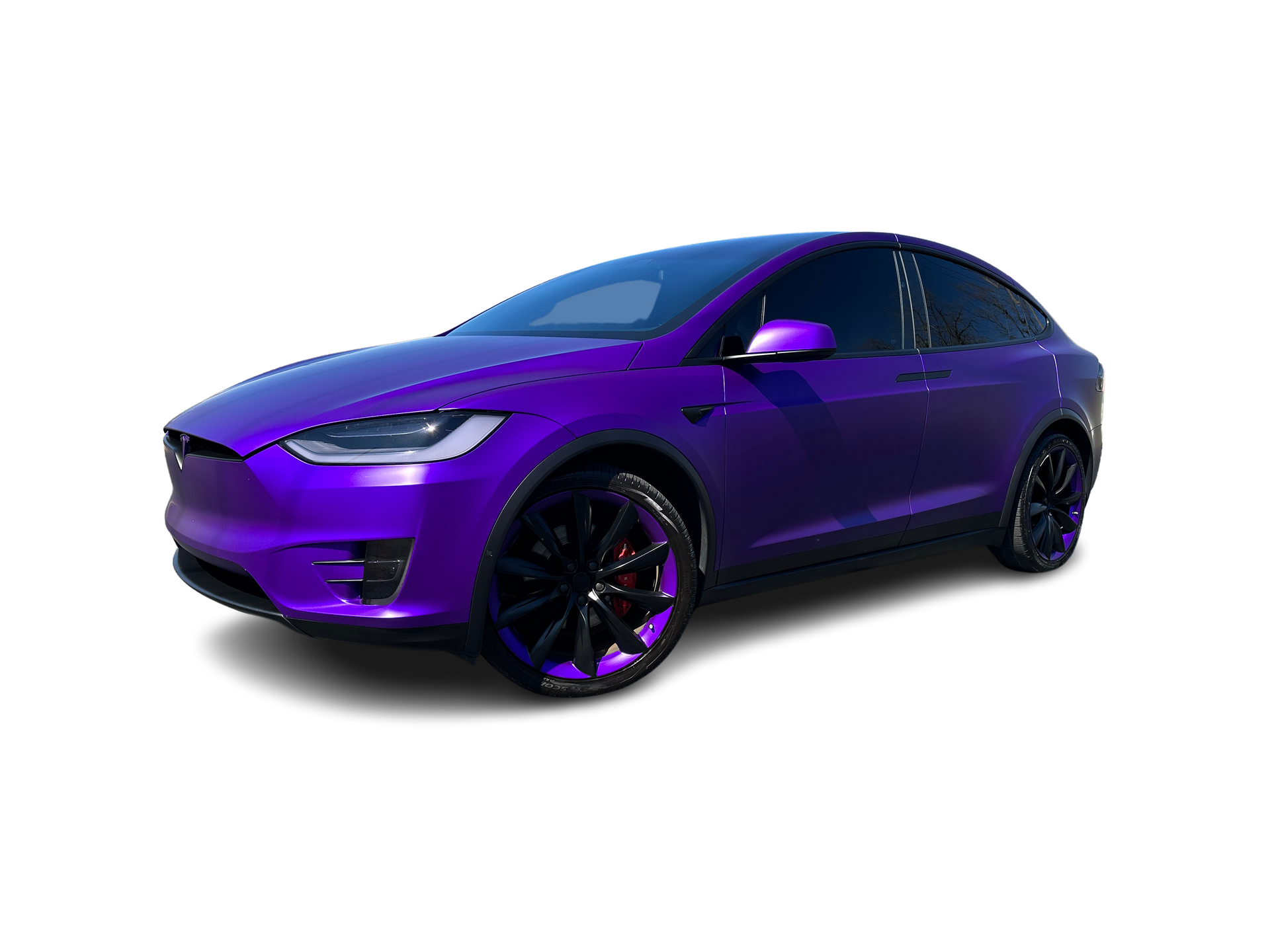 a purple tesla model x is on a white background .