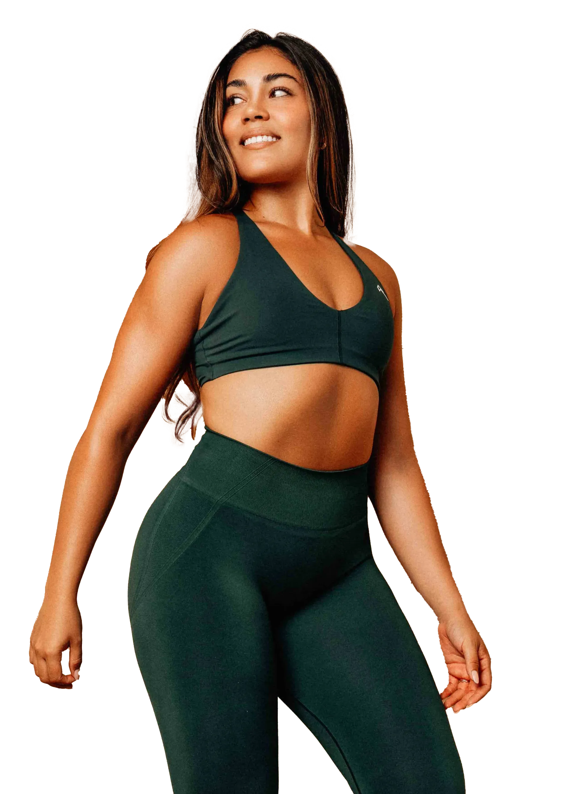 Carla Armendariz smiling in a green outfit