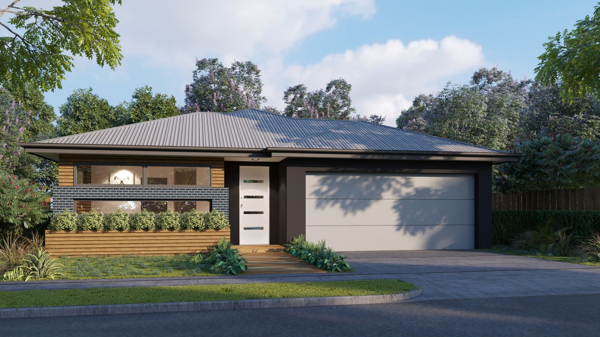 A House With a Garage, Green Grass and Trees — Kareela Constructions In Hillvue, NSW