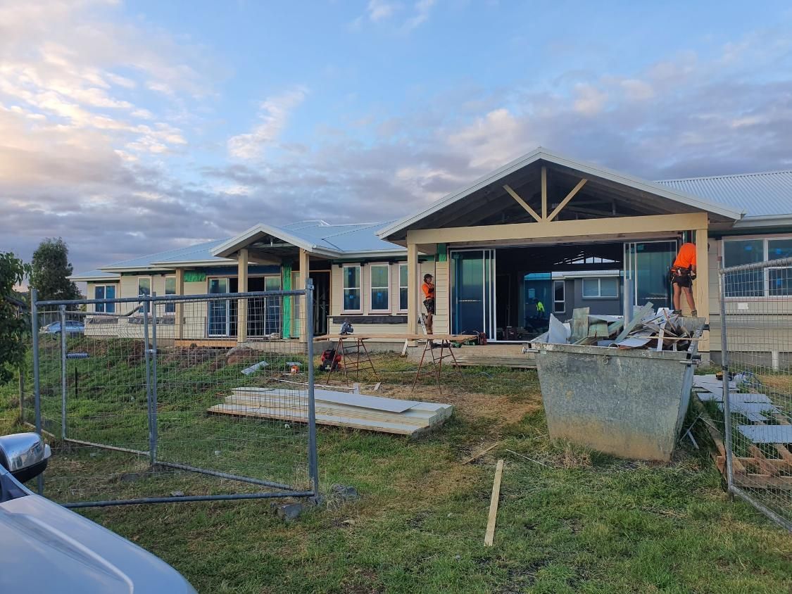 A Large House is Being Built in the Middle of a Grassy Field — Kareela Constructions In Tamworth, NSW