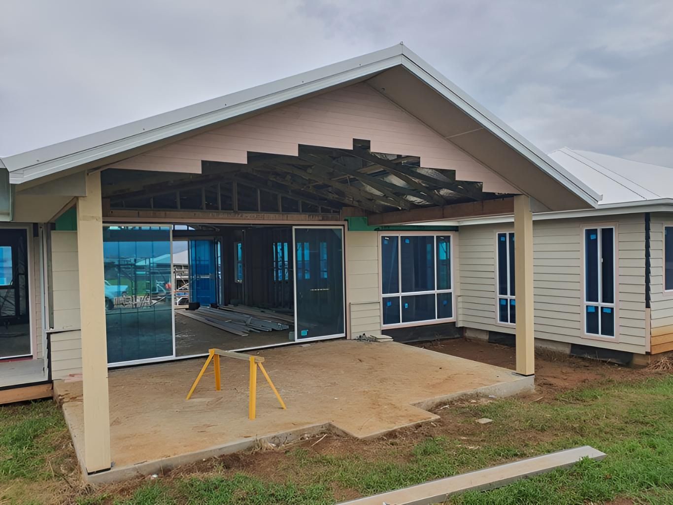 A House is Being Built With a Lot of Windows and a Porch — Kareela Constructions In Tamworth, NSW