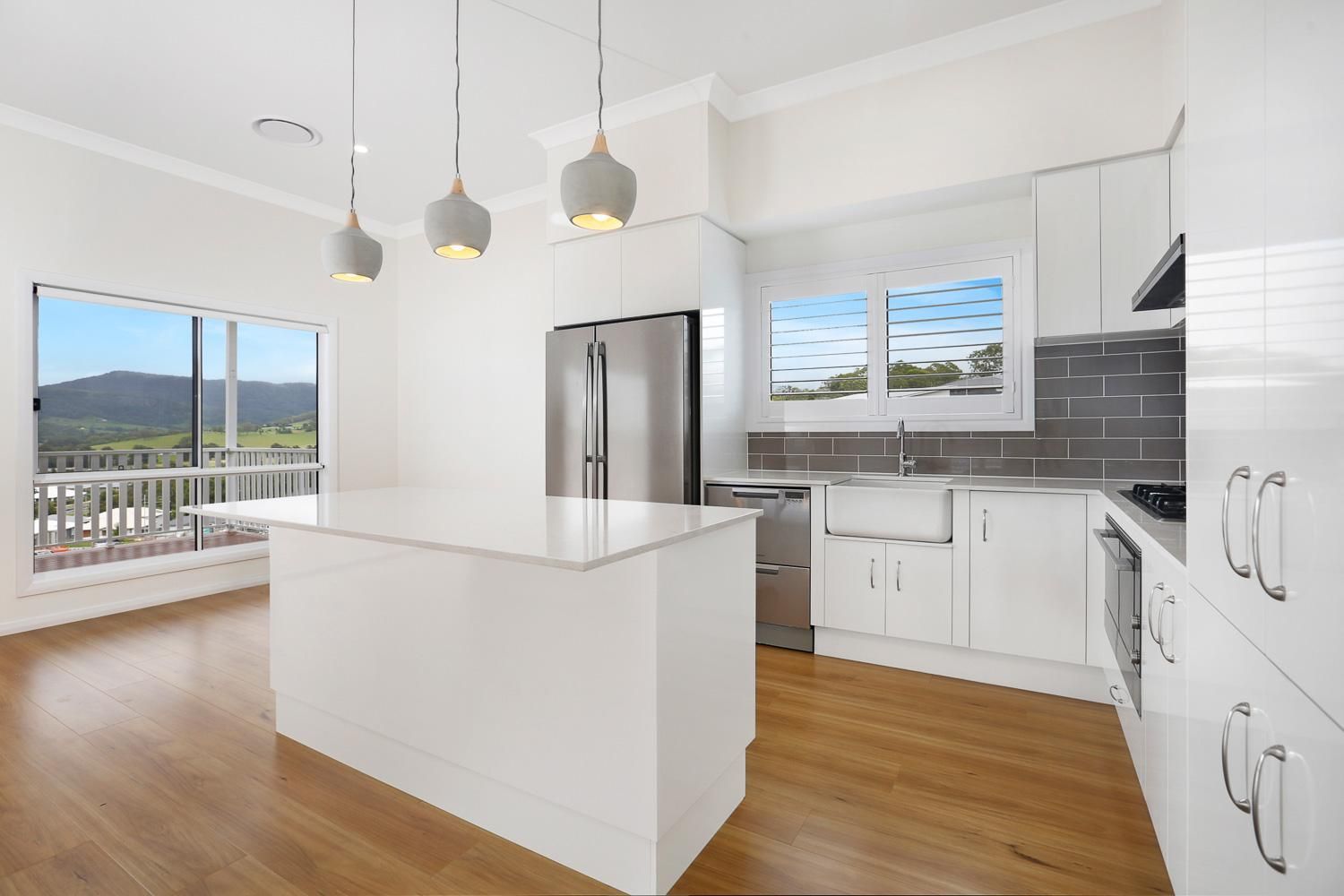 A Kitchen With White Cabinets — Kareela Constructions In Tamworth, NSW