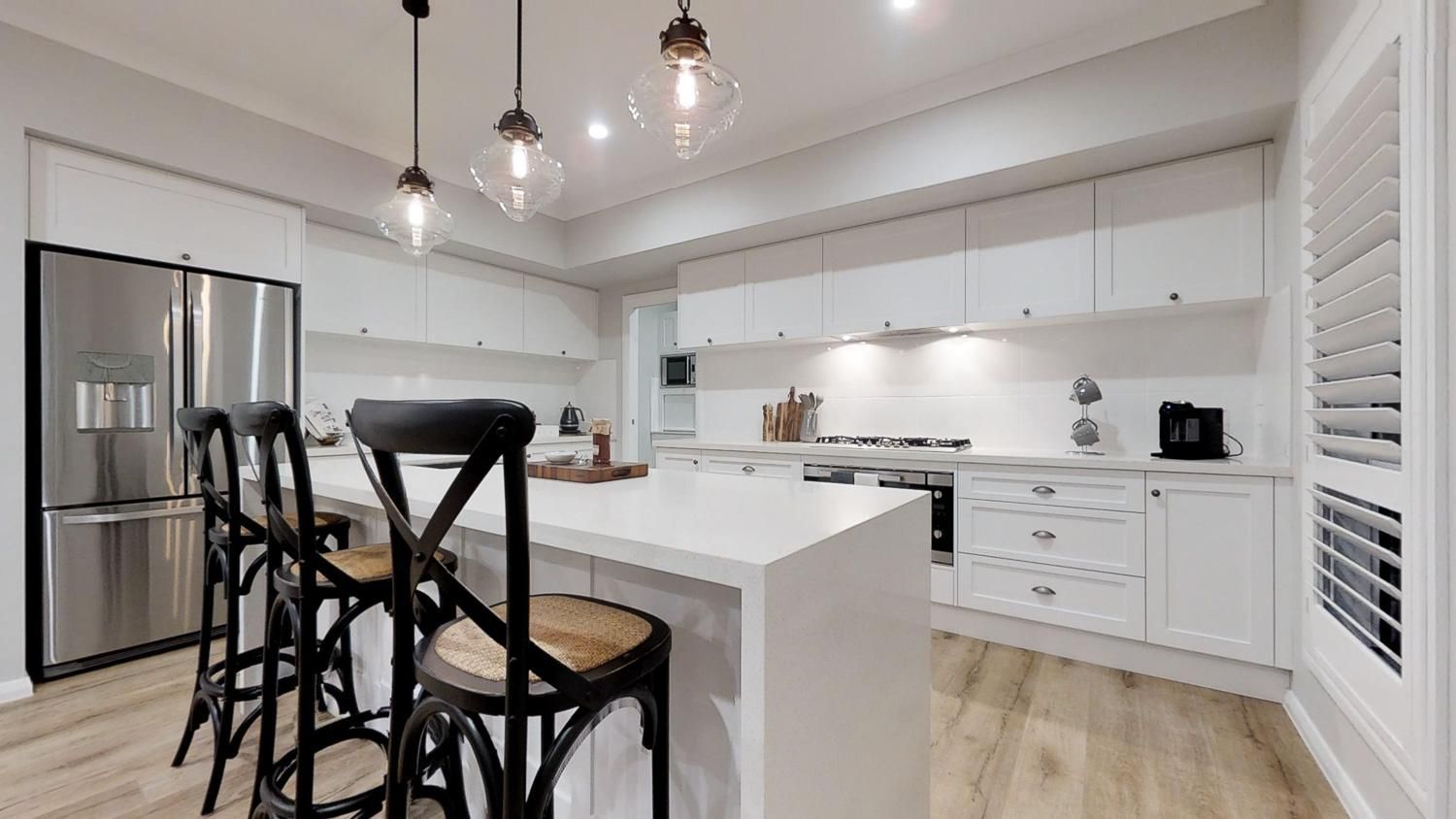 A kitchen with white cabinets — Kareela Constructions In Tamworth, NSW