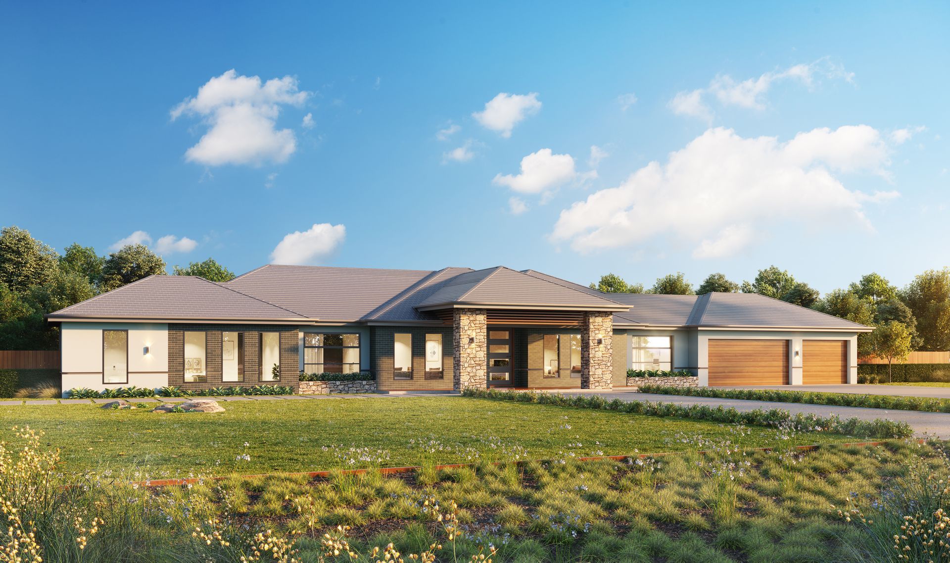 A Large House is Sitting on Top of a Lush Green Field — Kareela Constructions In Hillvue, NSW