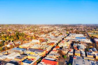 An Aerial View of a City With Lots of Buildings and Trees — Kareela Constructions In Armidale, NSW