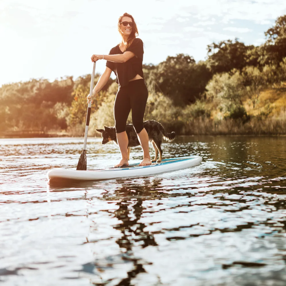 Girl paddle boarding |  Beck at Wells Branch