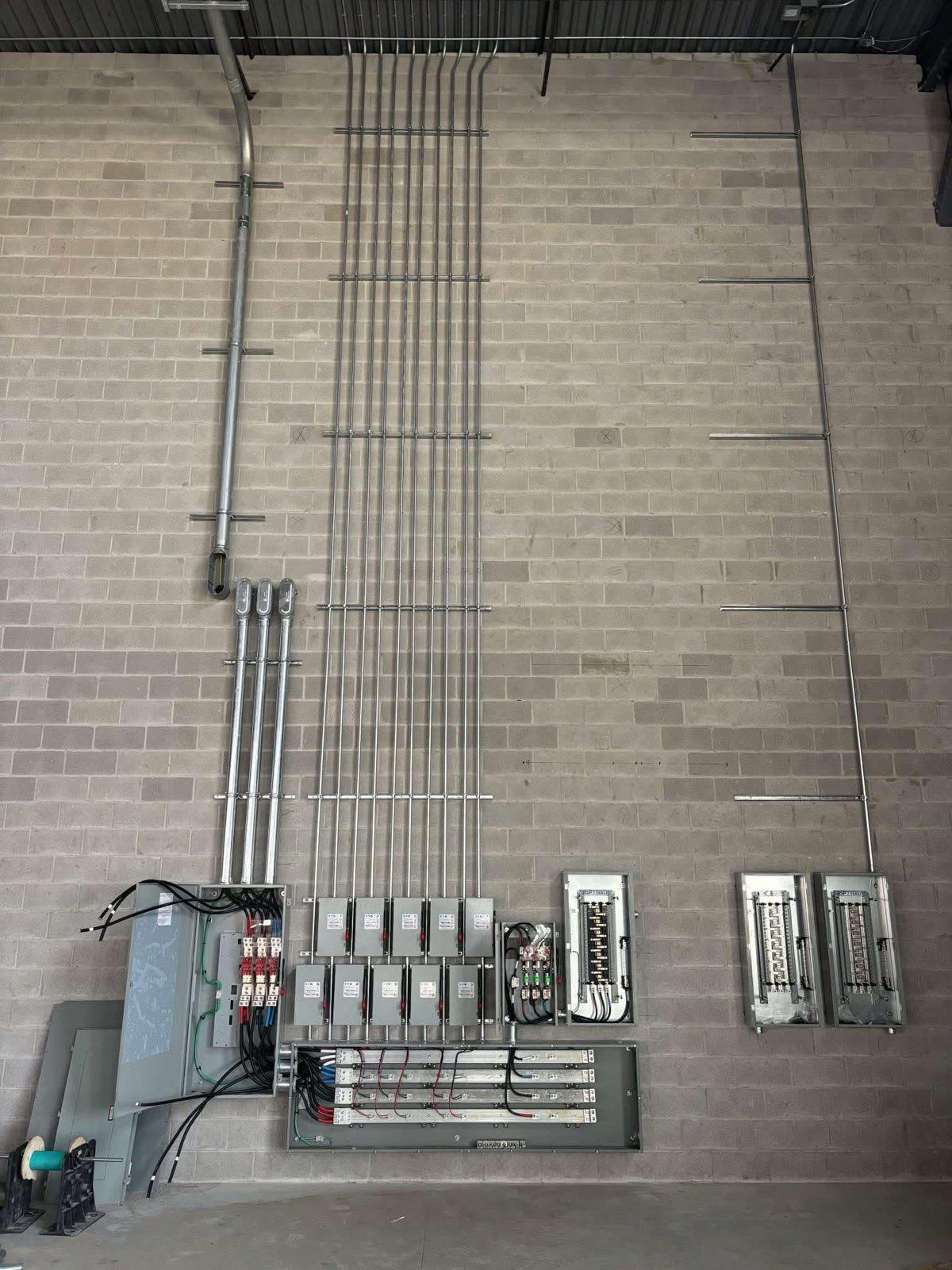 Industrial Electrical Contractor - A row of blue boxes on a white wall