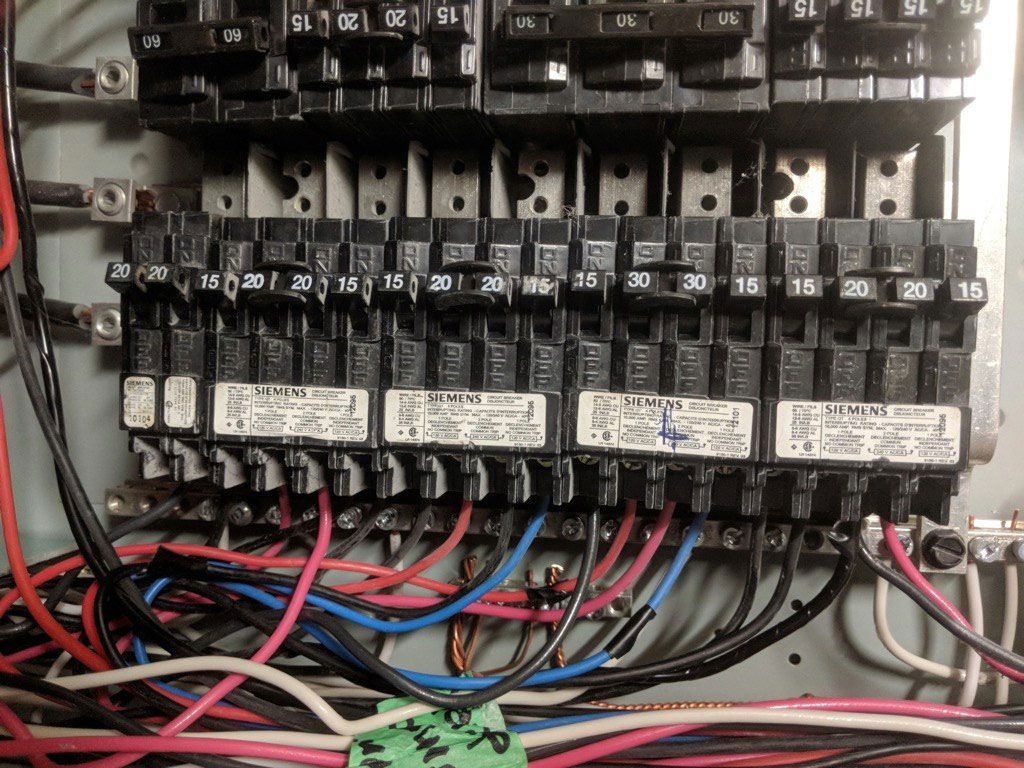 Commercial Electrical Contractor - A bunch of wires are connected to a electrical box