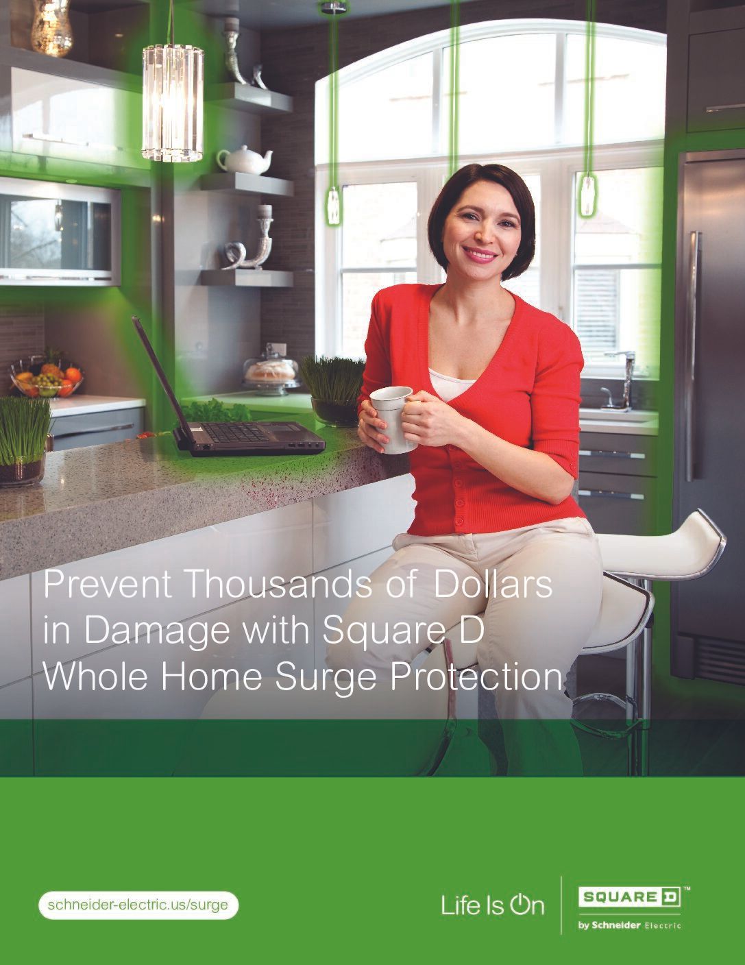 A woman is sitting at a counter in a kitchen holding two cups of coffee.