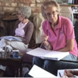 Two experienced ladies guiding groups with their lessons