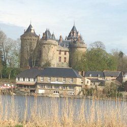 A beautiful French castle beside a lake