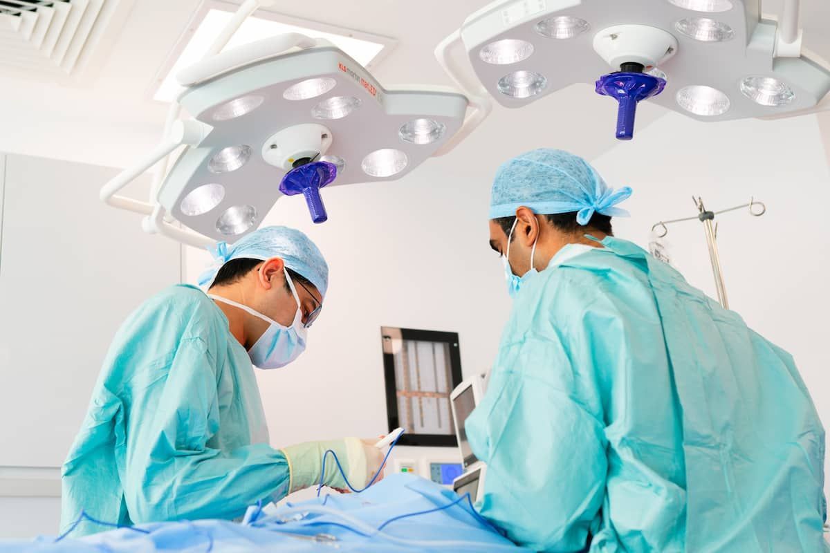 doctors operating in a plastic surgery in london