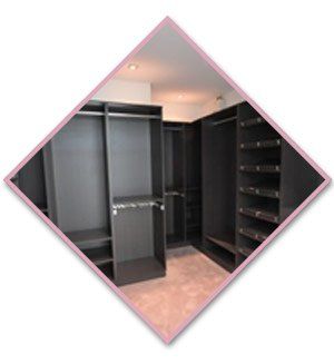 walk in wardrobe with black shelves