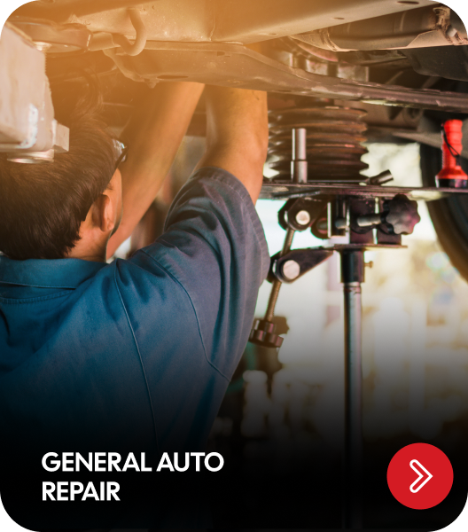 Mechanic working under a car at a repair shop. Text: General Auto Repair. Red arrow | Genesis Automotive and RV Repair