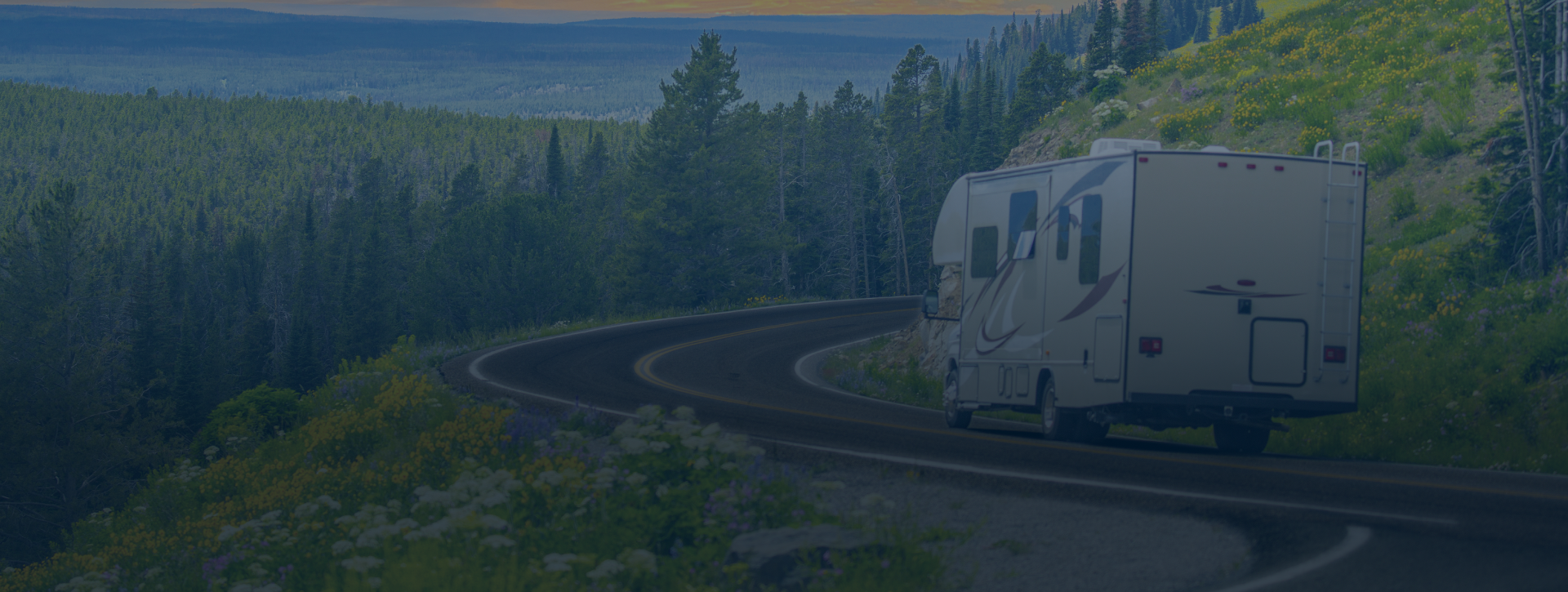 RV repair shop exterior with an RV parked out front. 