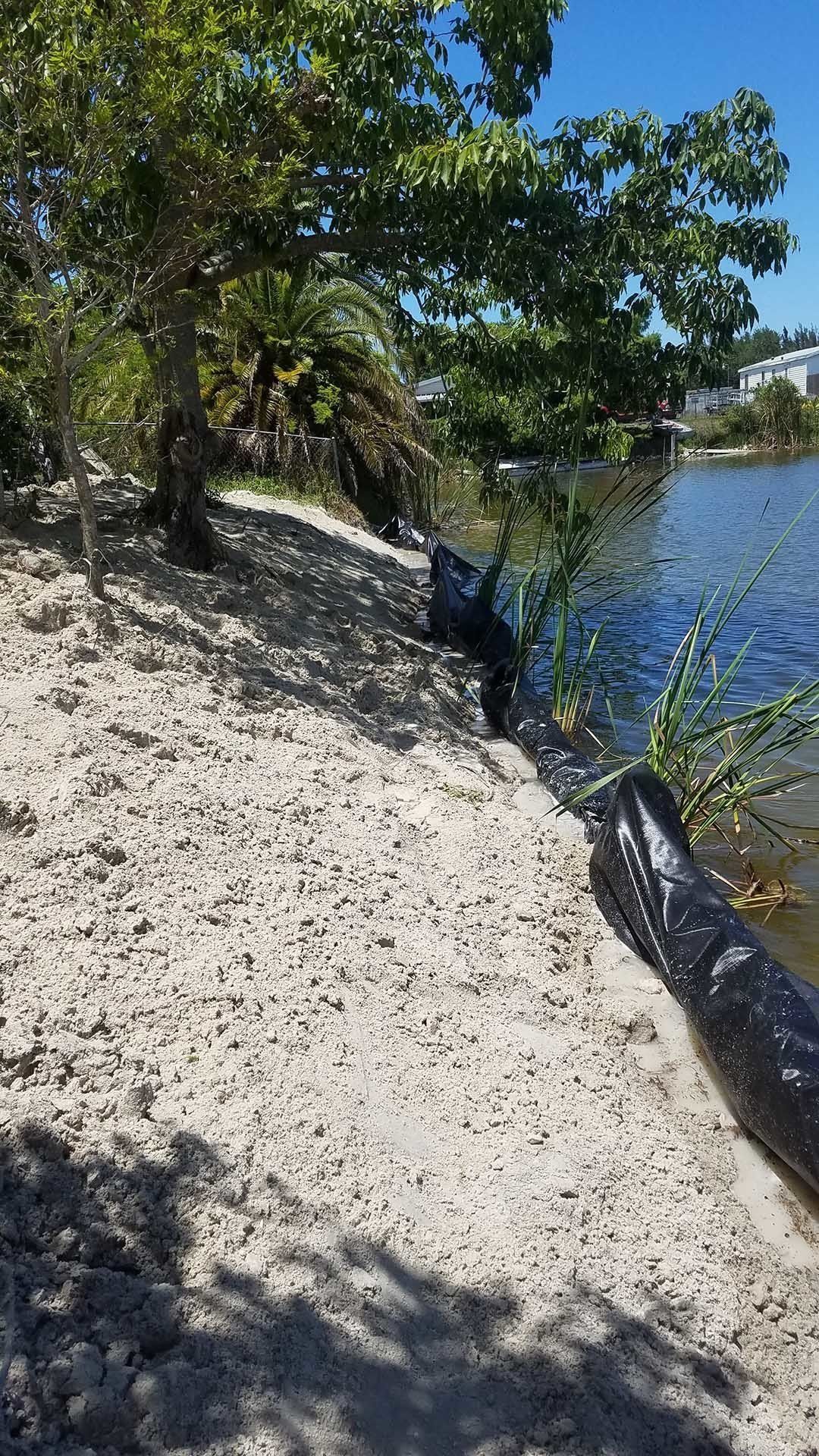 Pond Side — Alva, FL — Campions Landscaping & Grading, Inc.