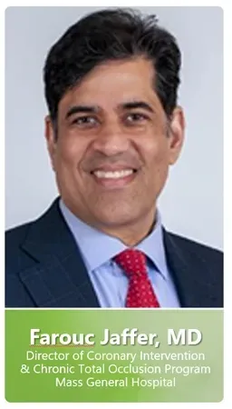 A man in a suit and tie is smiling for the camera.