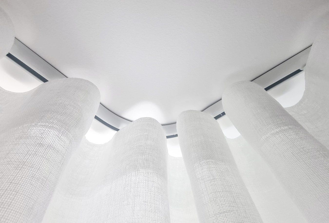 Looking Up at White, Columnar Fabric — Glenn Koek - Shutters - Curtains - Blinds in West Wollongong, NSW
