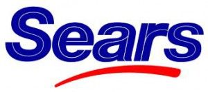 A blue and red sears logo on a white background