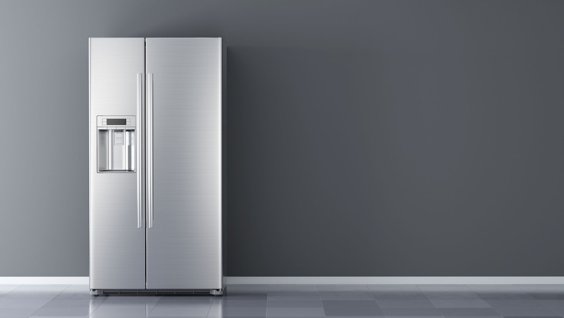 A stainless steel refrigerator with a water dispenser on the door.