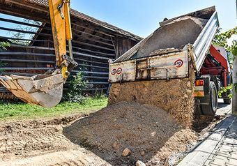 Truck Purring The Sand — C & E Earthmoving in Moss Vale, NSW