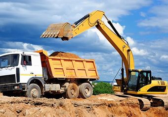 Excavator Loading Dumper Truck — C & E Earthmoving in Moss Vale, NSW