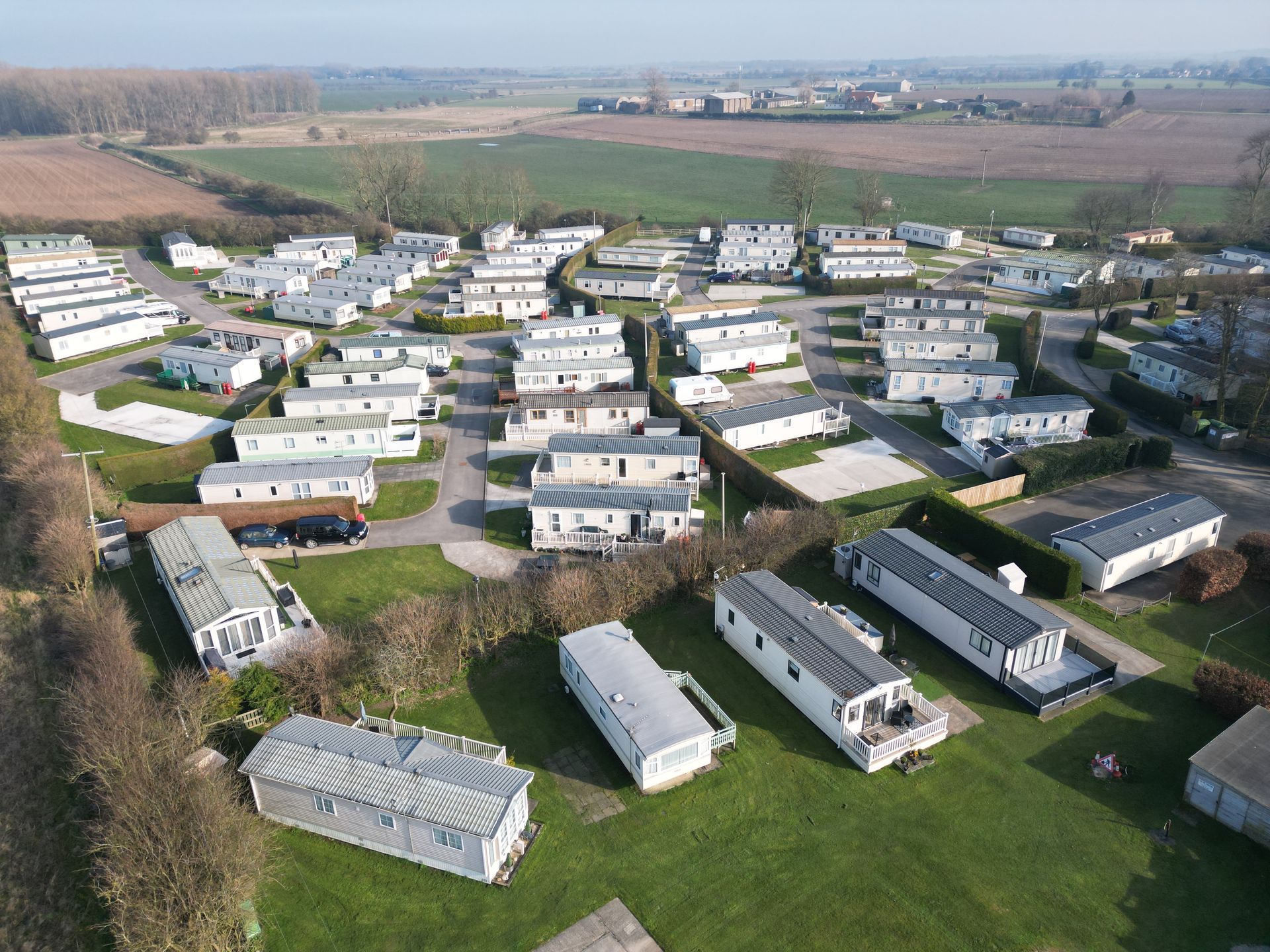 An aerial view of a holiday park in yorkshire with lodges