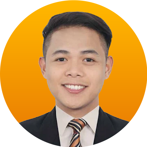 A man in a suit and tie is smiling in a yellow circle.