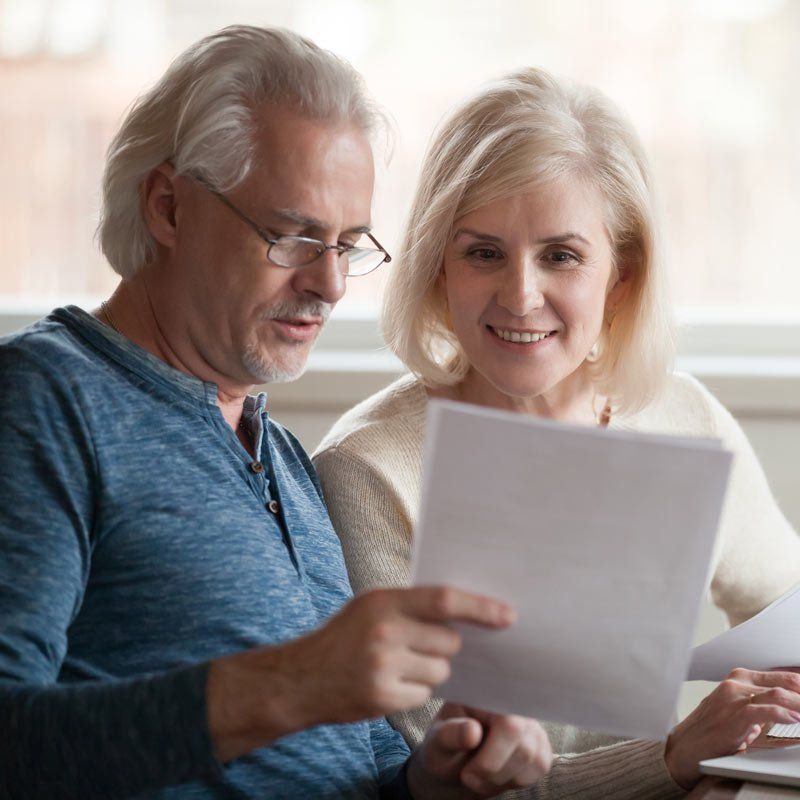 Medicaid Expert Holding Elderly's Hands — Bluffton, IN — Jerry Flack & Associates