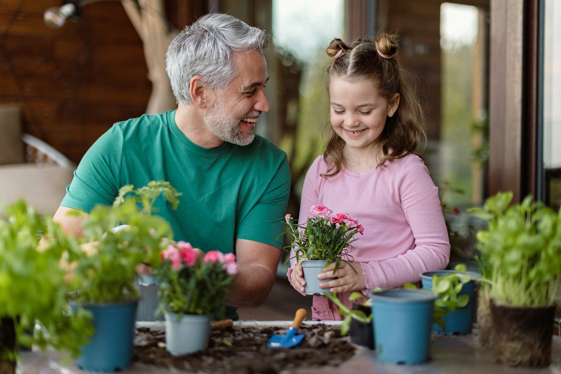 father and daughter gardening