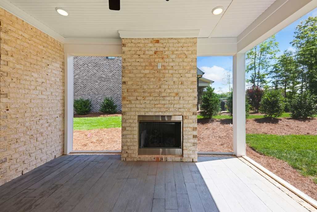 There is a fireplace in the middle of the room.