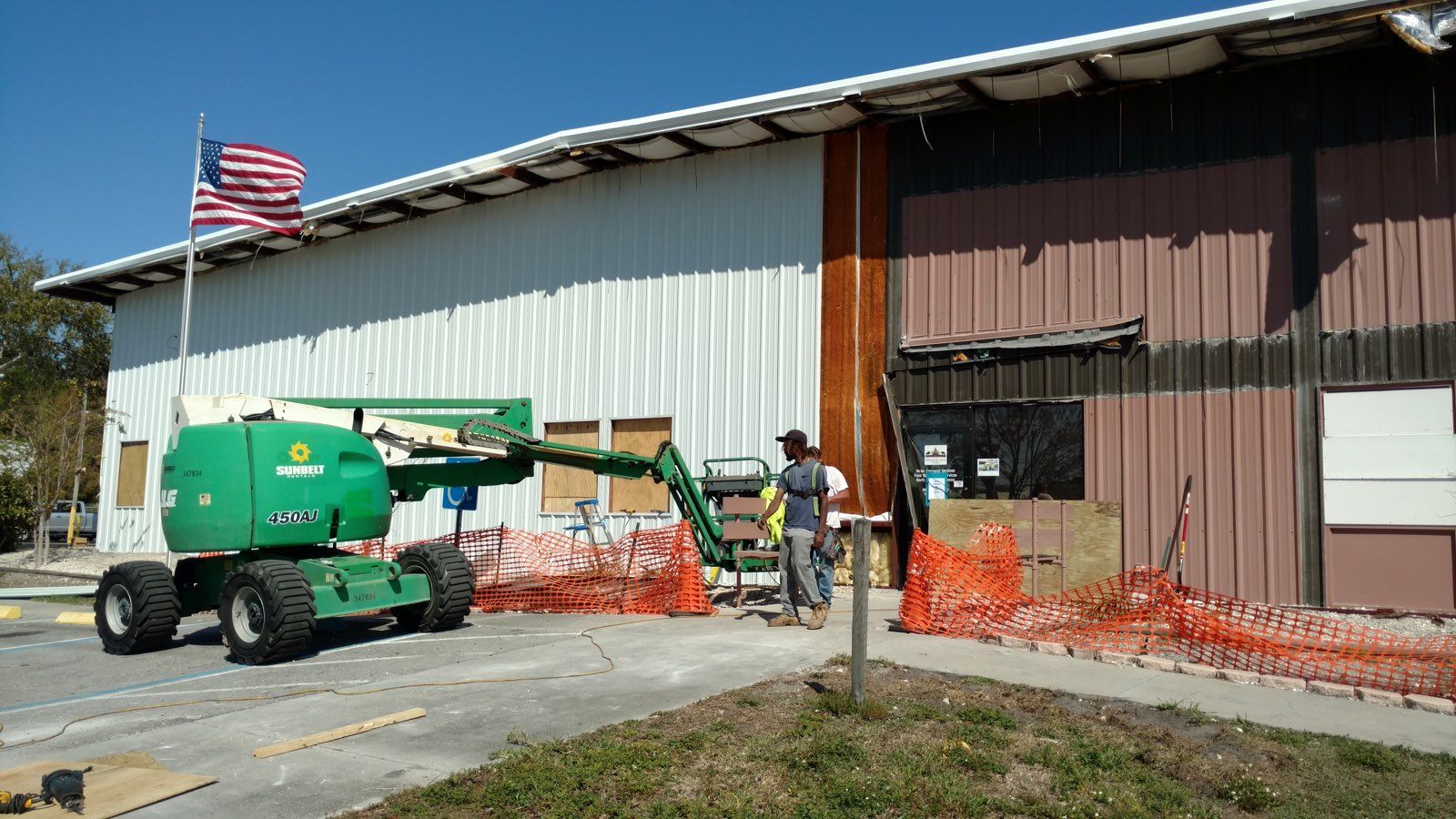 Warehouse with Worker Outside — Tampa, FL — George Gsolar & Co.