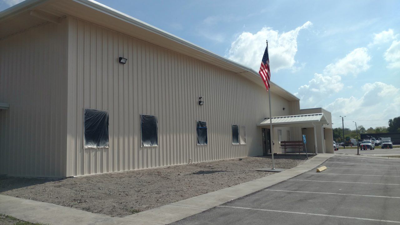 Warehouse with American Flag — Tampa, FL — George Gsolar & Co.
