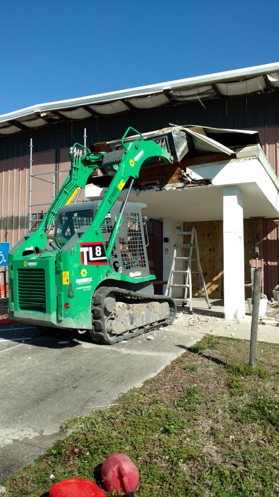 Green Construction Vehicle — Tampa, FL — George Gsolar & Co.