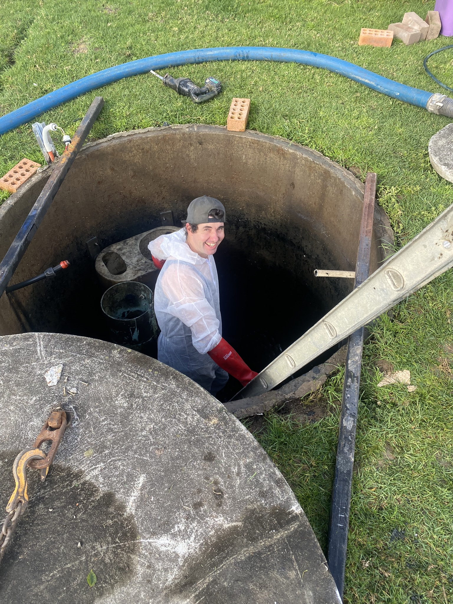 Man Fixing The Wastewater Treatment System — Wastewater Treatment System in Nowra, NSW