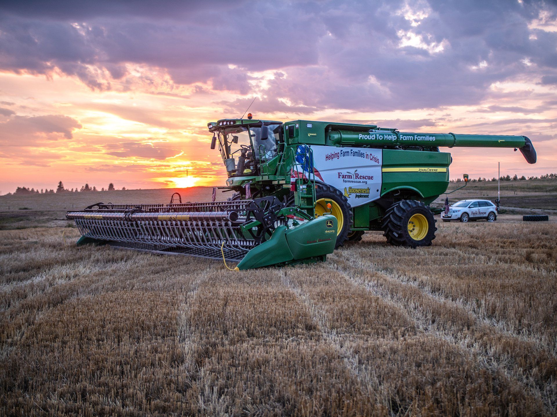 Gooseneck Implement John Deere Equipment For North South Dakota   Gooseneck Combine Sunset 1920w 