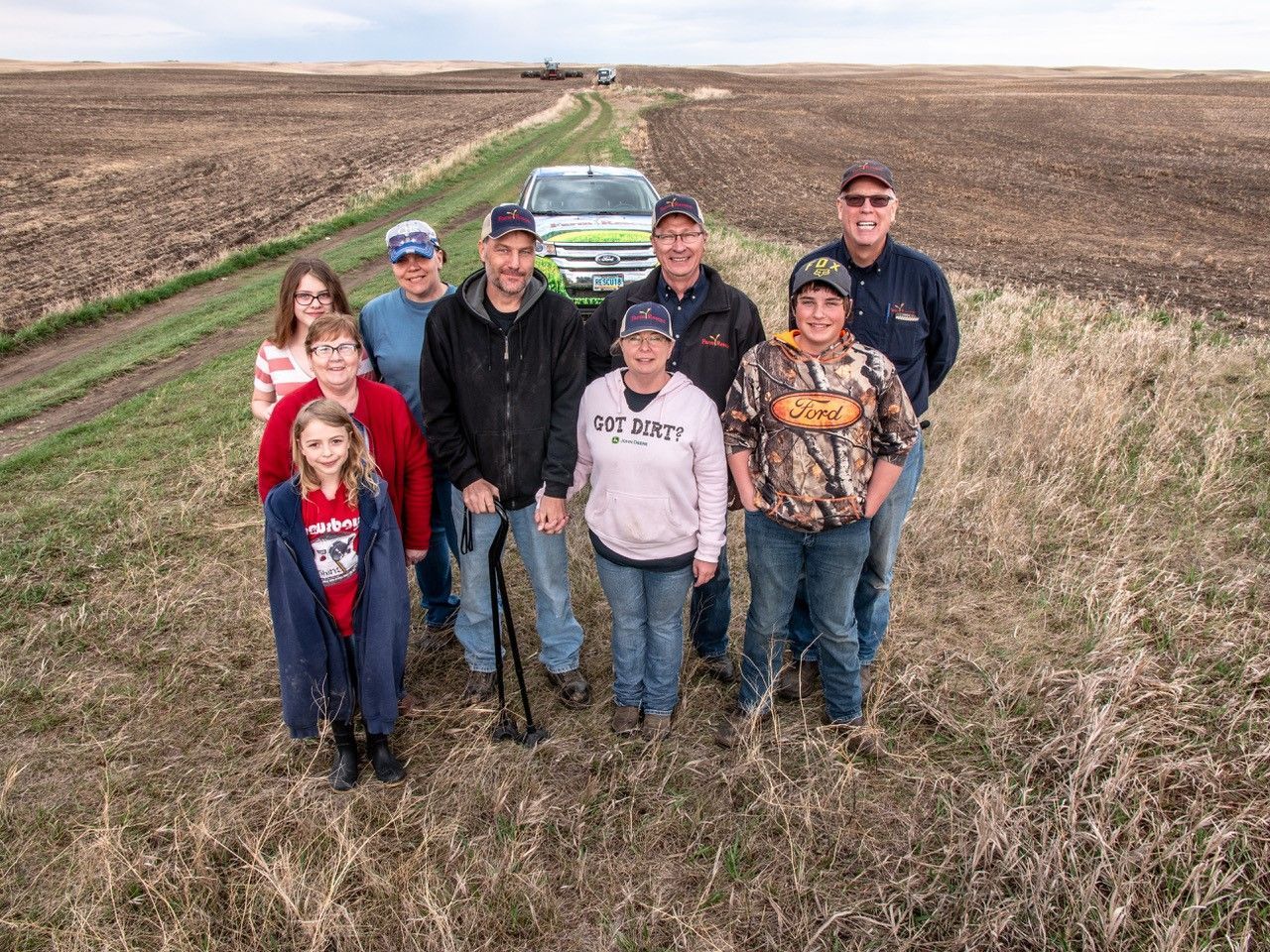 Jamie and Nikki Johansen Family of Ryder and a couple Farm Rescue volunteers.
