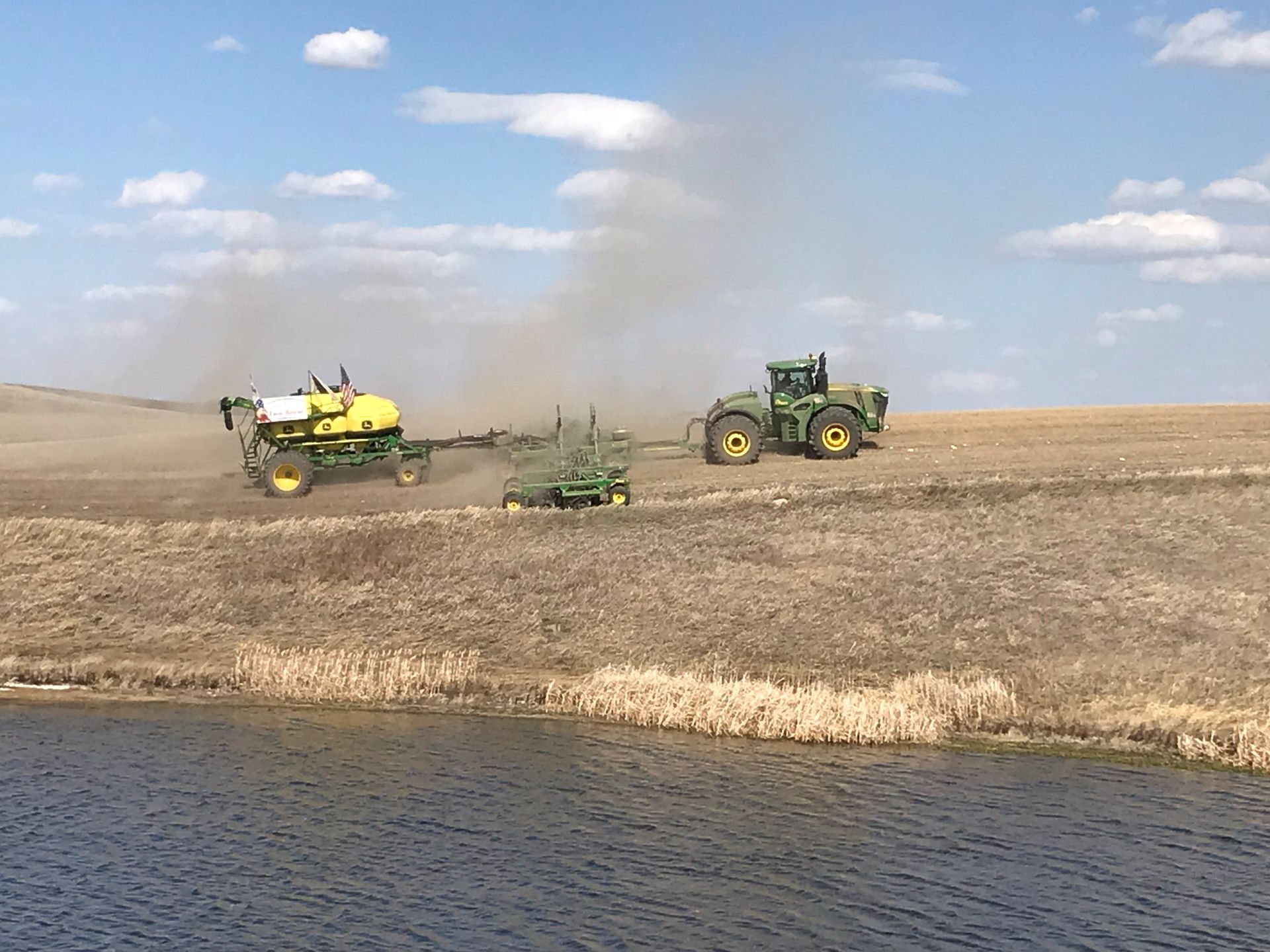 If you look close in this picture you can see the cart hitch is turning black as this is where the hydraulic hose failed. We saw you about an hour and a half later. – Jerry Burau