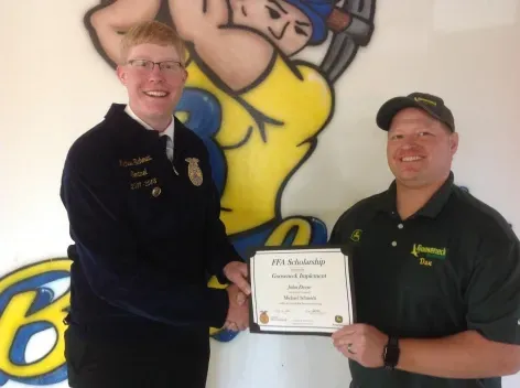 Dan Stadick, Gooseneck Implement Recruiter and Michael Schmidt of Beulah